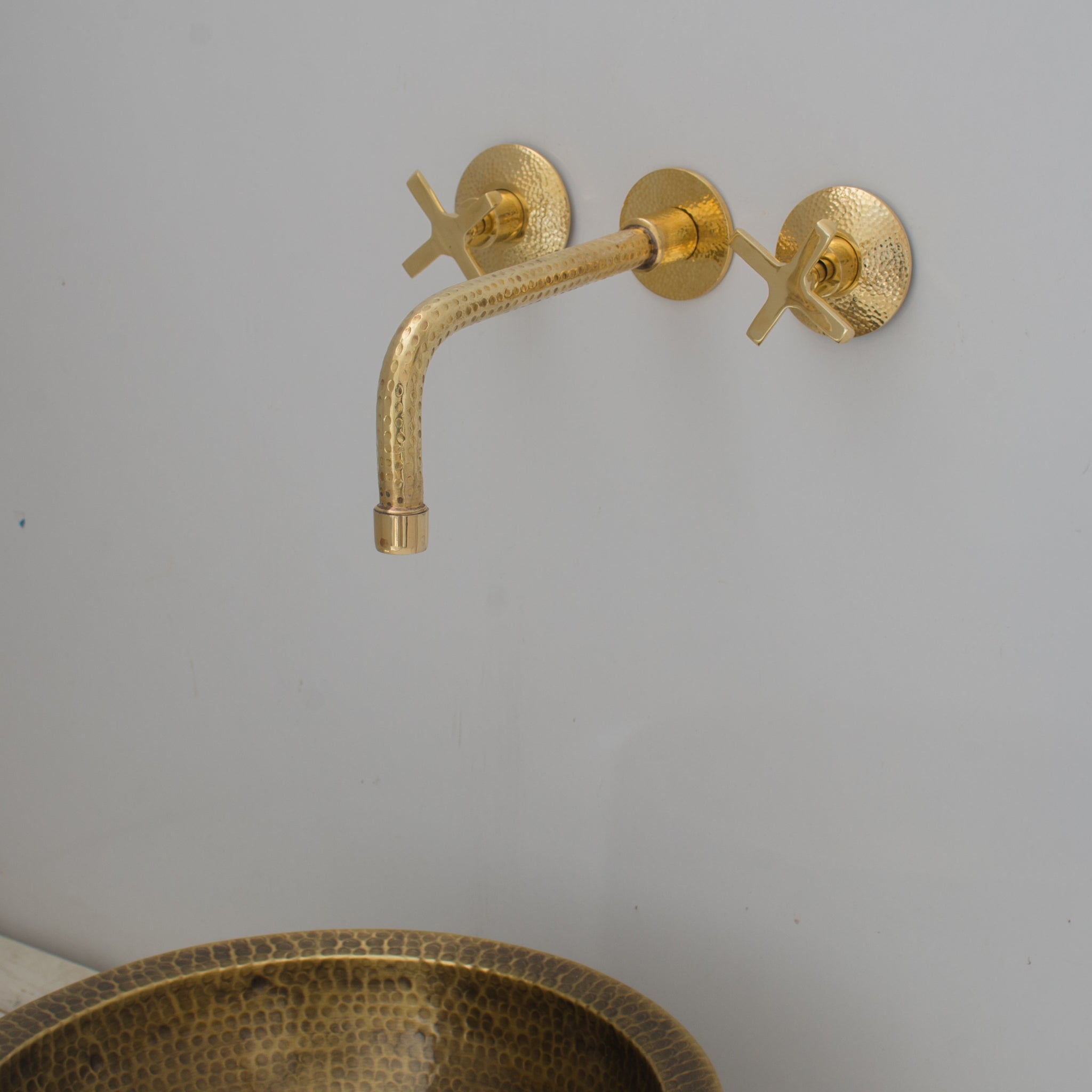 https://www.insideast.com/cdn/shop/products/built-in-brass-bathroom-faucet-hammered-wall-sink-faucet-907405.jpg?v=1680233876